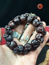 Skull bangle. 13 skulls entirely sculpted by hand. buffalo horn - $1,453.81 MXN