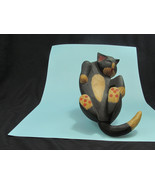 black and tan wooden cat - $420.05 MXN