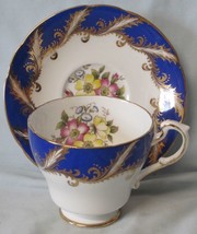 Paragon Cup &amp; Saucer Floral Pattern white with Cobalt &amp; Gold Trim Outsid... - $14.84