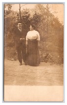 RPPC Cute Couple Standing in the Road UNP Postcard XC7 - $4.90