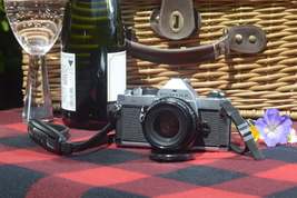 Vintage Pentax MX 35mm SLR Camera with 50mm f1.7 lens. Lovely condition for its  - £206.04 GBP