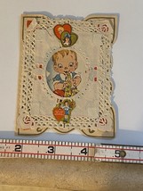 Vintage 1940&#39;s Fold-Open Valentine  - Young boy playing a  SAXOPHONE lace - $13.10
