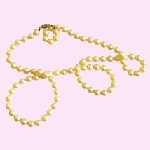 Faux Pearl Knotted Necklace 28” Strand Gold Tone Cream Color Safety Clasp - £11.13 GBP
