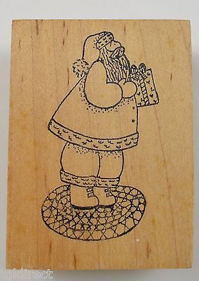 Wood Mounted Rubber Stamp By Rubber Inkpressions Santa Holding Present Crafts - $7.84