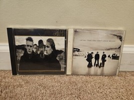 Lot of 2 U2 CDs: The Joshua Tree, All That You Can&#39;t Leave Behind - $8.99