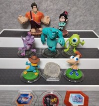 7 Disney Infinity Figures Monsters Inc Perry Phineas Wreck It Ralph Power Discs - $31.46