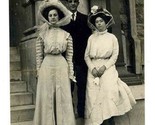 2 Women in Fancy Hats &amp; Dresses pose with Man Real Photo Postcard CYKO S... - £23.34 GBP