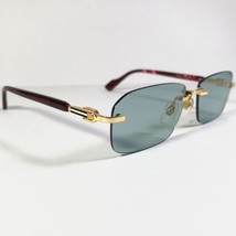 Gucci GG1221S 003 Gold/Dark Red Rectangular Rimless Sunglasses - $245.00