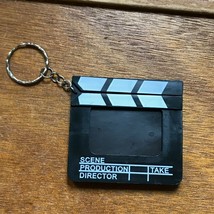 Gently Used Black &amp; White Plastic Movie Scene Production Picture Frame K... - £5.40 GBP