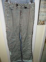An item in the Sporting Goods category: LIQUID BOARDWEAR HOUNDSTOOTH SKI PANT VENTURE 2500  SIZE M WOMEN'S EUC