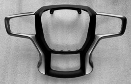 OEM metallic silver steering wheel trim with black insert 2019+ Chevy - $562.94 MXN