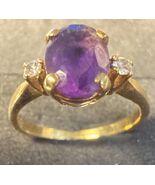 Authenticity Guarantee

This is a vintage 18k yellow gold amethyst and d... - $740.89 CAD