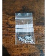 Small acrylic butterfly earrings - $73.50 MXN