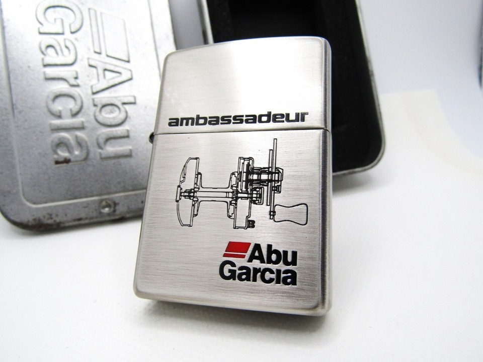 Abu Garcia Ambassader Engraved Zippo 1997 MIB Rare - $208.89