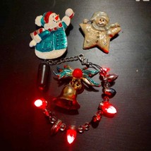 Amazing fun lot of Christmas brooches and light up Christmas bracelet - $23.76