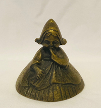 Vintage Peerage England brass bell Dutch girl in dress bonnet with wings 2&quot; tall - £7.84 GBP