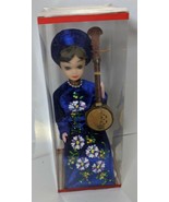Vietnam Doll With Musical Instrucment Doll - $476.86 MXN