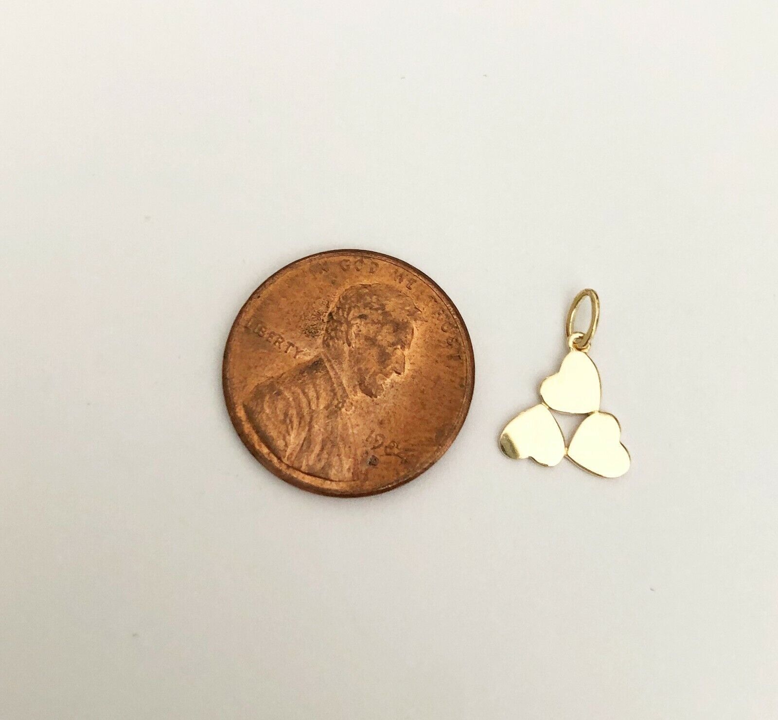 14k Yellow Gold Tiny triple heart charm pendant Item image 3