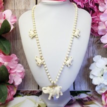 Vintage White Celluloid Elephant Charms Beaded Necklace with Elephant Pendant - $24.95