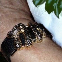 Unique black leather bracelets with distinctive writing and design - $20.79