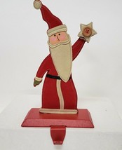 Primitive Santa &amp; star Stocking Hanger Holder red cast iron &amp; leather - $15.00