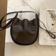 The R0w U-shaped drawstring niche design women&#39;s bag, leather carrying  bag, cro - £193.76 GBP