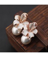 NOBLE BLOOMING LILY 18K GOLD PLATED WOMEN ROSE GOLD EARRINGS - $19.99
