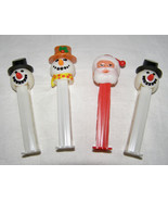 VINTAGE LOT OF 4 PEZ DISPENSERS - WINTER/XMAS THEME - SNOW MEN (3) + SAN... - $9.90