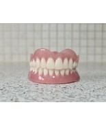 Full upper and lower dentures/false teeth, Brand new. - $135.00