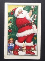A Merry Christmas Santa Lighting the Tree on Fire Gold Embossed Postcard c1920s - $9.99