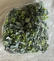 Lush artificial greenery with vibrant green leaves Garland - $10.80