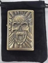 Sharp Brass Kantai Fanged Skull Lighter W/Raised Detail - $16.83 CAD