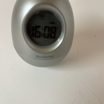 Brookstone “Bob” Silver Oval Egg Wobble Clock 5-in-1 Alarm/Date/Timer/Temp - $14.95