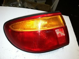 Driver Left Tail Light Outer Fits 95 MAZDA MILLENIA 388375 - $62.37