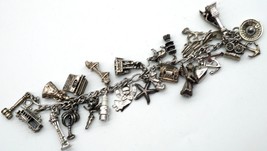 Sterling Silver Charm Bracelet 27 Charms Total weight 77.3 grams - £79.63 GBP