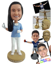 Personalized Bobblehead Nice young dentist holding a pulling tool with a face ma - £71.26 GBP