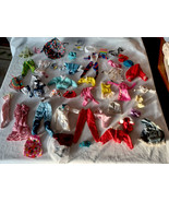 Barbie 10 Dolls 18 pairs of shoes about 70 pieces of clothing - $100.00