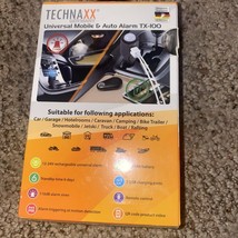 Technaxx TX-100 Car Alarm with Charging Function and PIR Motion Sensor.. - $24.00