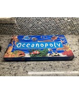 OCEANOPOLY Monopoly Fishy Ocean Board Game  All Game Pieces Are There  O... - $8.91