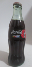 Coca-Cola Classic THE  OFFICIAL SOFT DRINK OF NASCAR 8 oz  Full Bottle - $0.99