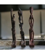 Vintage hand carved statues, small chip in wood at the base of the first... - $30.00