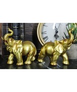 Feng Shui Gold Patina Elephant Left And Right Pair Figurines With Trunks Up - $27.32 CAD