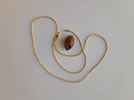 the rare Argan seed pendant - $1,781.97 MXN