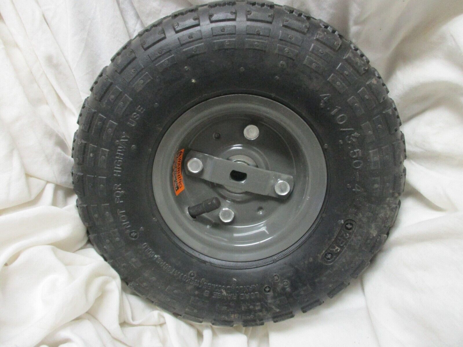 Primary image for Agri-Fab Wheel & Tire Assy 4.10/3.5-4 Wheel/Drive AGR-48865