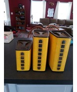 Vintage Lincoln Beautyware Yelow and black Tin Canisters 3 Pieces - $546.72 MXN
