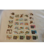 Lot of 30 Mozambique Stamps Dogs, Sports, Butterflies, from 1970s - £22.92 GBP