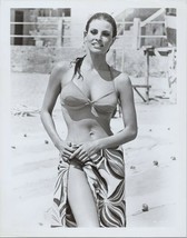 Raquel Welch smiles on beach wearing bikini with towel around waist 8x10 photo - £9.61 GBP