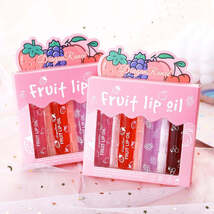 4Pcs Peach Strawberry Roll-on Lip Balm Set Makeup Moisturizing Clear Cherry - $4.94