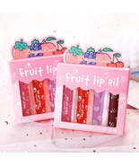 4Pcs Peach Strawberry Roll-on Lip Balm Set Makeup Moisturizing Clear Cherry - $4.94