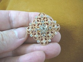 bb604-35) white rhinestone crystal filigree scrolled flower gold tone br... - $16.99